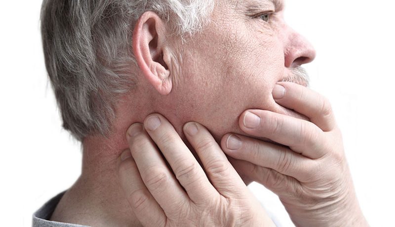 Боль под челюстью: причины